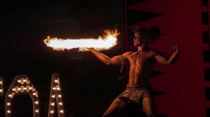 Hawaiian dancer with flame in hand