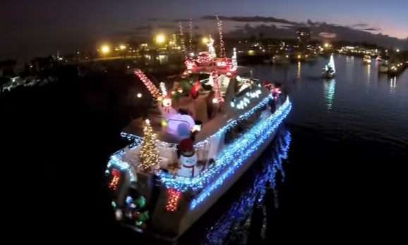 boat with Christmas lights around it